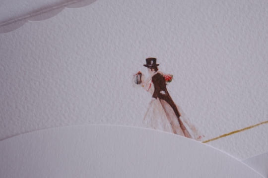 白色画纸上新郎与新娘相拥的画像