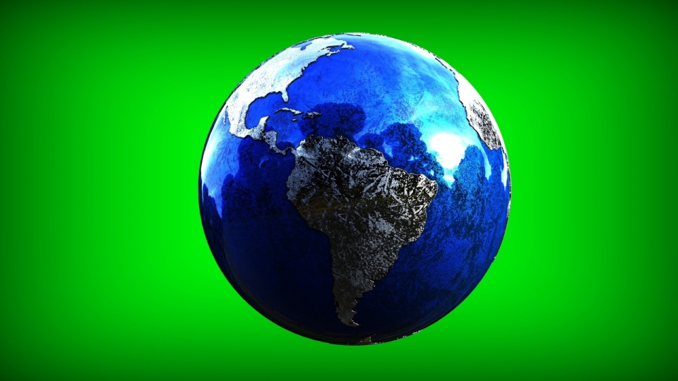 绿色背景上玻璃制成的精美地球模型