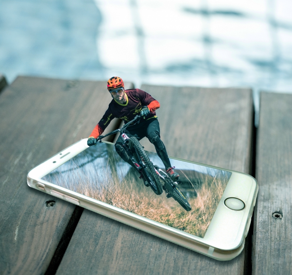 手机屏幕与自行车越野结合创意设计素材