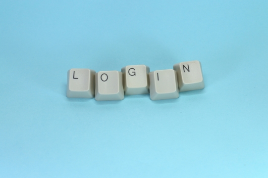 简约蓝色背景白色电脑英文字母键盘