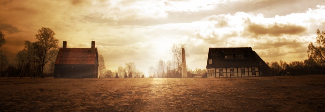 傍晚夕阳笼罩村庄小镇低矮房屋景观