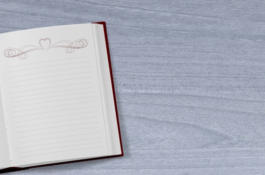 灰色木制桌面文艺空白红色封面笔记本