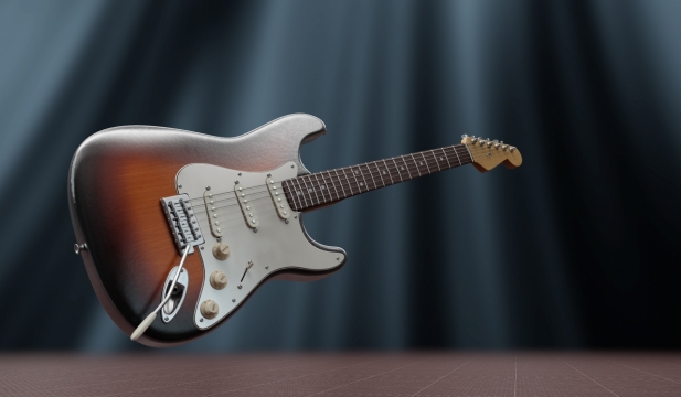 舞台灯光背景下的电吉他乐器摄影