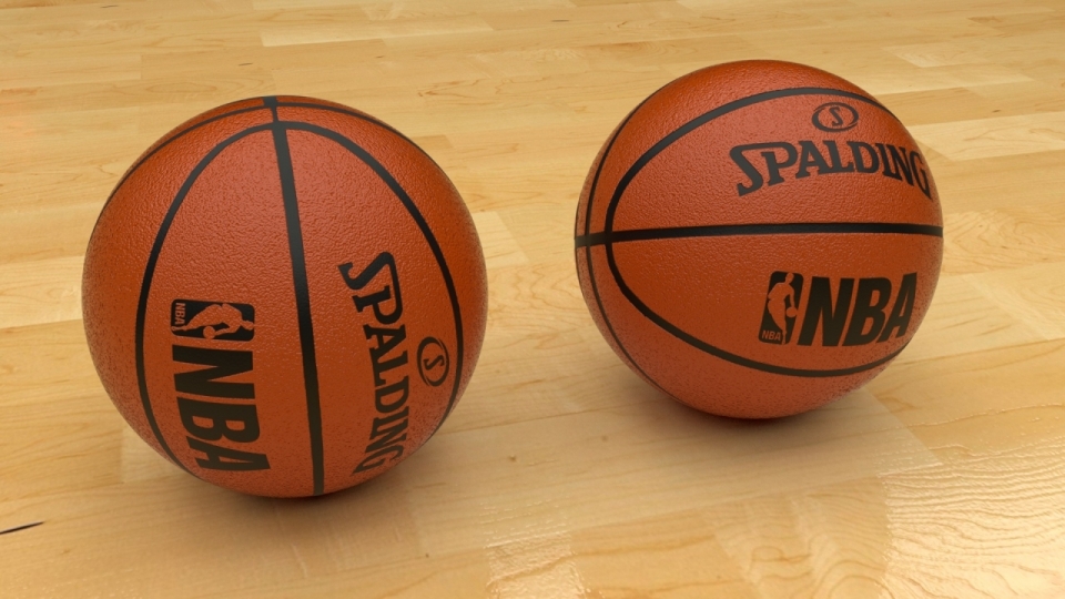 篮球场场地上两个篮球静物摄影