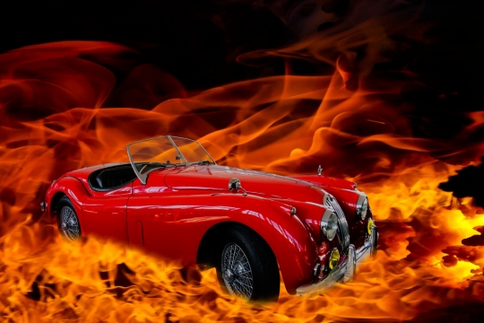 摄影入门教程_红色崭新敞篷轿车合成火焰特效