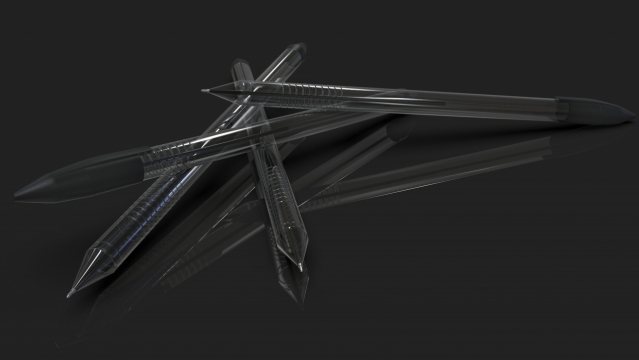 黑色桌面上的圆珠笔