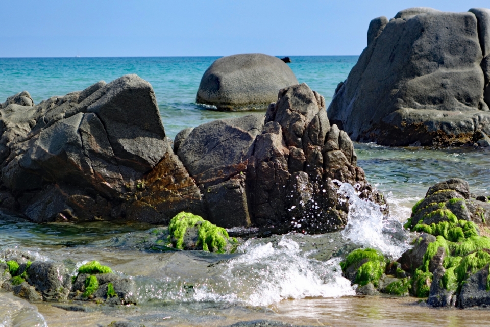 阳光蓝色天空自然大海岩石