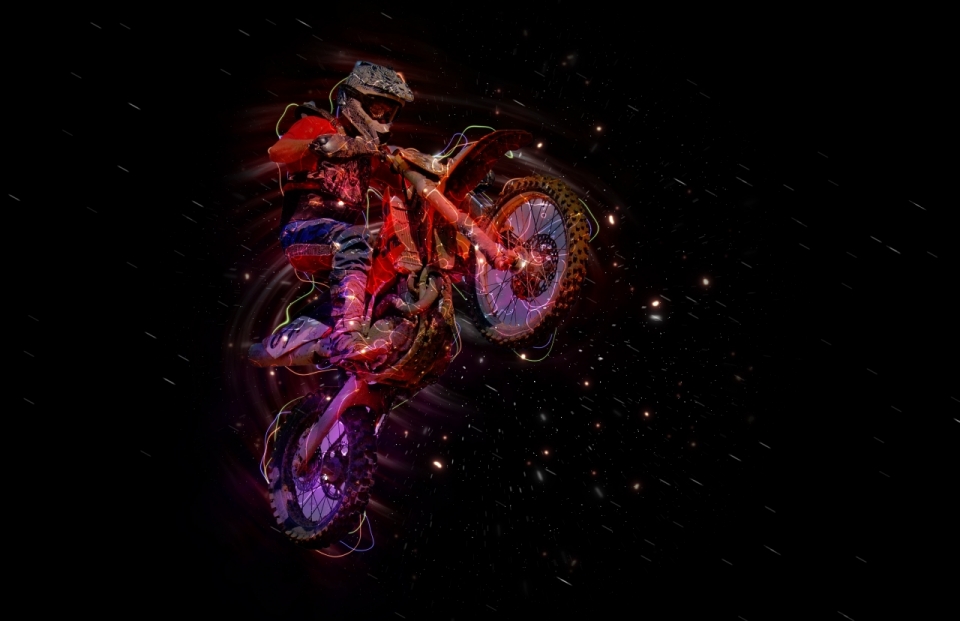 黑色背景越野摩托车运动员红色特效摄影