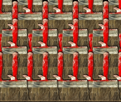 红色把柄棕色毛刷子重复排列构成