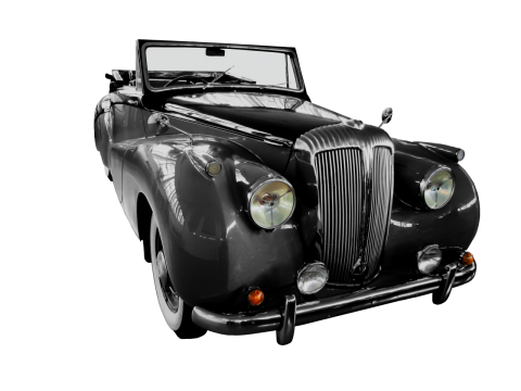 白色背景前的黑色复古老爷车