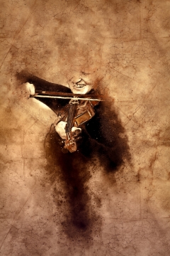 古老怀旧羊皮纸背景演奏小提琴音乐人