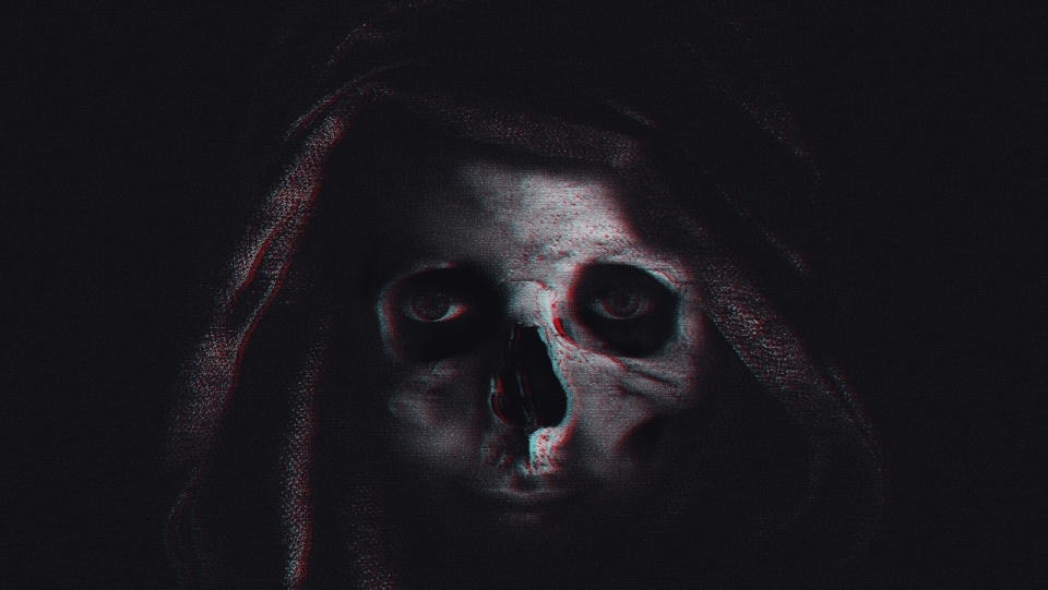 黑暗中披着头带着骷髅面具的神秘人