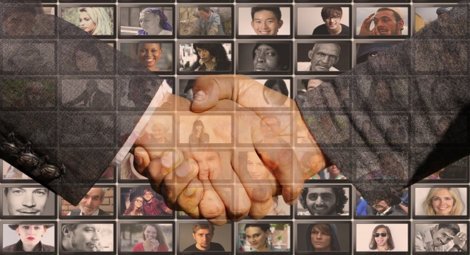 人物照片墙前握手西装商务男性手部特写