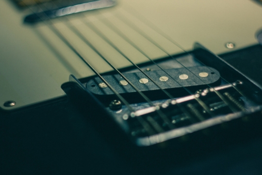 吉他琴弦弦端特写摄影